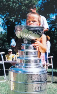  ??  ?? Chandler Stephenson poses with the Stanley Cup as a four-year-old. Even then, he had hockey in his blood and dreamed of playing in the NHL.