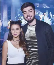  ??  ?? In the spotlight: Hosts and MTV VJs Yassi Pressman and Andre Paras
