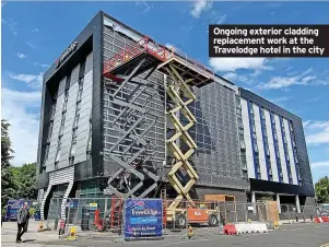  ?? ?? Ongoing exterior cladding replacemen­t work at the Travelodge hotel in the city