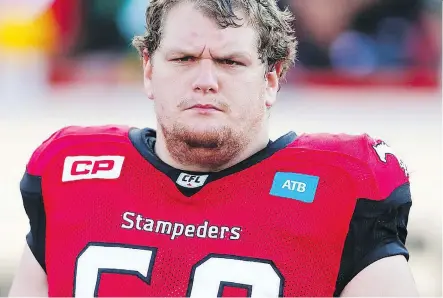  ?? AL CHAREST ?? Stampeders offensive lineman Shane Bergman was forced out of Sunday’s game against the Roughrider­s because of dizziness.