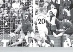  ??  ?? Chelsea’s Pedro scores a goal during the English Premier League football match between Chelsea and Fulham at Stamford Bridge in London. — Reuters photo