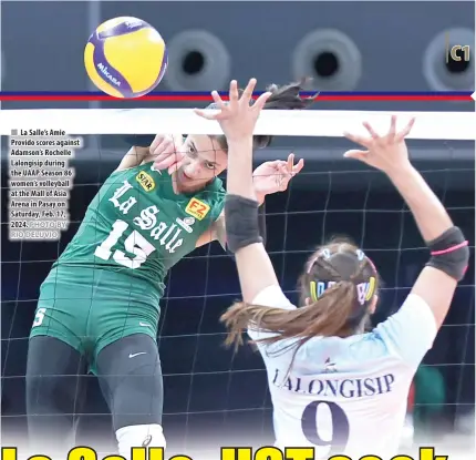  ?? PHOTO BY RIO DELUVIO ?? La Salle’s Amie Provido scores against Adamson’s Rochelle Lalongisip during the UAAP Season 86 women’s volleyball at the Mall of Asia Arena in Pasay on Saturday, Feb. 17, 2024.