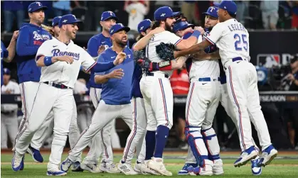  ?? ?? The Texas Rangers celebrate after defeating the Baltimore Orioles to clinch their playoff series. Photograph: Jerome Miron/USA Today Sports