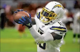  ?? Rick Scuteri Associated Press ?? ARTAVIS SCOTT, bidding to make the Chargers’ roster, had one catch for three yards in the preseason opener against Arizona. He knows he must do more.