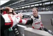  ?? AJ MAST — THE ASSOCIATED PRESS ?? Brad Keselowski celebrates after winning the Brickyard 400 at Indianapol­is Motor Speedway on Sept. 10.