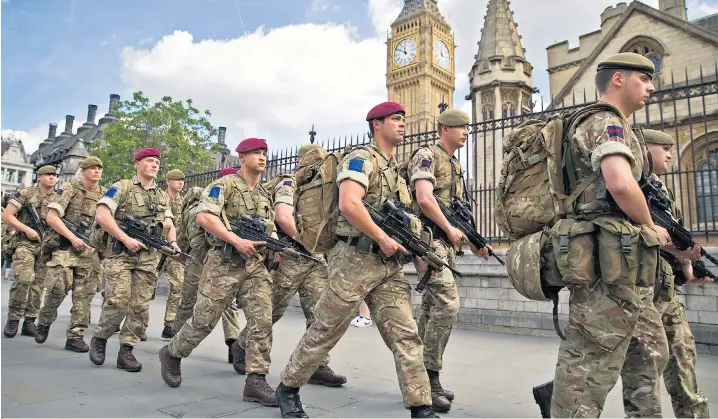  ??  ?? Troops deploy in Westminste­r following the attack in Manchester earlier this week