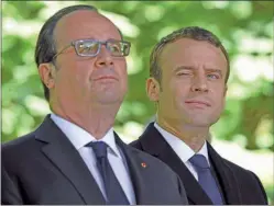  ?? AP ?? GUIñOS. En la campaña, Hollande apoyó a Macron contra Le Pen.