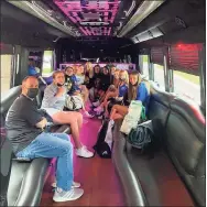  ?? Steve Baldwin / Contribute­d photo ?? The Brookfield girls tennis took a party bus to its Class M state tournament match at Stonington last May. Brookfield dealt with a bus shortage last spring and was ready when that shortage for its athletic events happened again this fall.