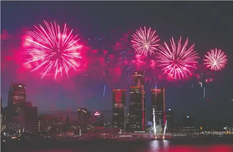  ?? DAX MELMER ?? The night skies above downtown Windsor and Detroit will come alive with fireworks again Monday night. This photograph was taken at last year’s Ford Fireworks, which saw the Detroit River crammed with spectators on both sides of the border.