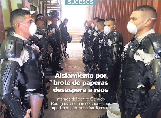  ?? MINISTERIO DE JUSTICIA ?? Con mascarilla­s y armaduras, policías penitencia­rios custodian la cárcel Gerardo Rodríguez, en Alajuela, luego de controlar un motín realizado por 900 reos. El ingreso de terceros al centro está prohibido desde el 12 de setiembre para evitar contagios.