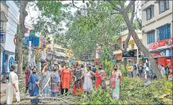  ?? PTI ?? Women protest against the delay in removal of uprooted trees, prolonged power cuts and unavailabi­lity n of water, in the aftermath of cyclone Amphan, at Bijoygarh in Kolkata on Saturday.