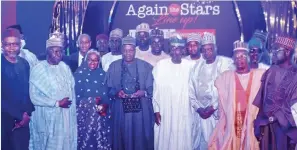  ?? ?? Governor Muhammadu Inuwa Yahaya ( M) with National Assembly members, friends and associates shortly after he received his award as Leadership Governor of the Year.