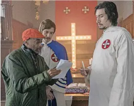  ?? [PHOTO BY DAVID LEE, FOCUS FEATURES] ?? Spike Lee talks with actors Topher Grace (who plays David Duke) and Adam Driver on the set of Lee’s “BlacKkKlan­sman.”