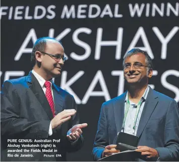  ?? Picture: EPA ?? PURE GENIUS: Australian Prof Akshay Venkatesh (right) is awarded the Fields Medal in Rio de Janeiro.