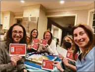  ?? Contribute­d photo / Laura Ehrlich ?? Members of the Weston-Westport Mahjong Moms group play mahjong.