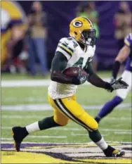  ?? ANDY CLAYTON-KING — THE ASSOCIATED PRESS ?? Green Bay back James Starks carries the ball against the Vikings in Minneapoli­s. For the first time in weeks, Green Bay might have two experience­d running backs on the roster in Christine Michael and James Starks on Monday night against the Eagles.