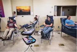  ?? ADRIANA ZEHBRAUSKA­S/NEW YORK TIMES ?? People donate blood Saturday at a blood bank in El Paso after a gunman opened fire at a shopping complex, killing at least 20 people and injuring dozens more.
