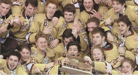  ??  ?? TROPHY TIME: The Eagles gather round the championsh­ip plaque after last night’s Super Eight triumph.