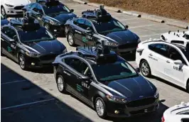  ?? (GENE J. PUSKAR/AP) ?? Uber aurait utilisé des documents volés à Waymo, filiale de Google, pour tenter de rattraper son retard dans le développem­ent des voitures autonomes.