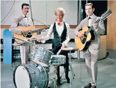  ?? ?? The Springfiel­ds in 1963, from left, Mike Hurst, Dusty Springfiel­d and Tom Springfiel­d: he wrote the millionsel­ling single The Carnival Is Over and found himself acclaimed the ‘fifth Seeker’