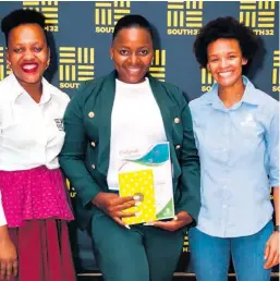  ?? ?? Thandeka Myeni (centre) received the prize for the most innovative and sustainabl­e business plan. She is congratula­ted by Balungile Mbele (Hillside Aluminium principal socio-economic developmen­t)and Cindy Cloete (Wessa head of programmes and projects)