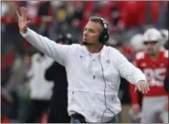  ?? JAY LAPRETE — THE ASSOCIATED PRESS ?? Ohio State head coach Urban Meyer signals during the second half against Michigan on Nov. 24 in Columbus.