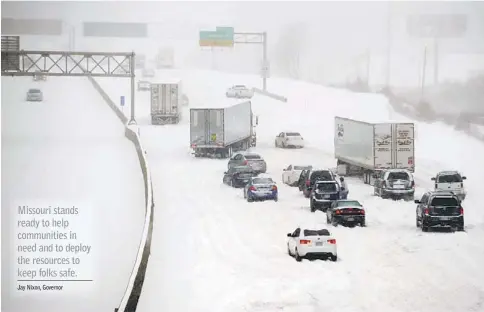  ??  ?? TRAFFIC STANDSTILL: Stalled vehicles are seen during a blizzard as traffic comes to a standstill on the I-635 in Kansas City, Kansas. — Reuters photo