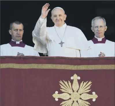  ?? PICTURE: AP PHOTO/ALESSANDRA TARANTINO ?? PEACE CALL:
Pope Francis after he delivered the Urbi et Orbi Christmas day blessing in the Vatican.