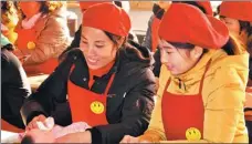  ?? GAO XIAOMING / FOR CHINA DAILY ?? Farmers in Lyuliang city attend a training course for domestic service.