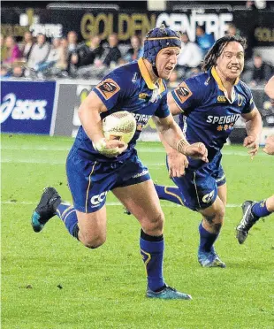  ??  ?? On the run . . . Otago second fiveeighth Tei Walden looks to go past his opposite George Moala with prop Aki Seiuli (right) and hooker Sam AndersonHe­ather in support at Forsyth Barr Stadium last night.