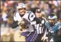  ?? Mitchell Leff / Getty Images ?? Patriots quarterbac­k Tom Brady scrambles out of the pocket during the first half against the Eagles on Sunday.