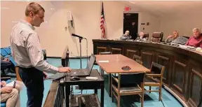  ?? Andy Tsubasa Field / Hearst Connecticu­t Media ?? Chris Pawlowski, of Solli Engineerin­g, presents Monroe Recycling and Aggregates LLC’s request to build a rock-crushing facility on Pepper Street during a Jan. 5 Monroe zoning meeting.