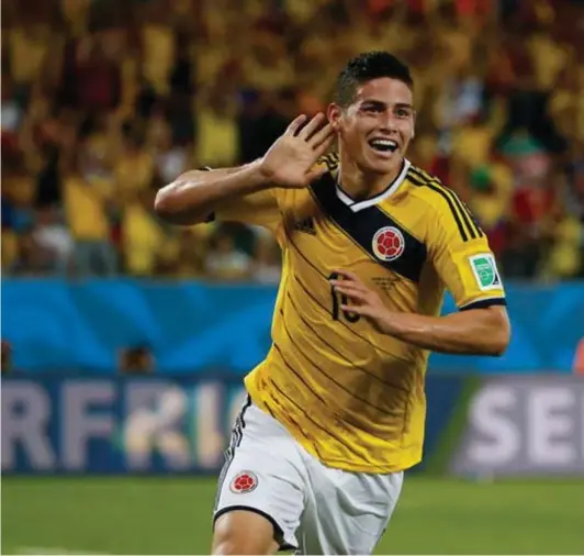  ?? ?? ► En el Mundial de Brasil 2014, las seis
anotacione­s del colombiano James Rodríguez lo pusieron en la parte alta del podio.