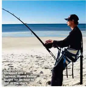  ?? ?? Strapped into a harness, Blaine Kenny fought for an hour to reel in the shark