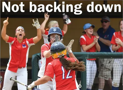  ?? Photo by Jerry Silberman | risportsph­oto.com ?? The Mount St. Charles softball team is looking for more jubilant scenes at Rhode Island College like the one that unfolded this past Saturday when Emily Cournoyer (12) collected a RBI single against Johnston. The Mounties must defeat Barrington twice...