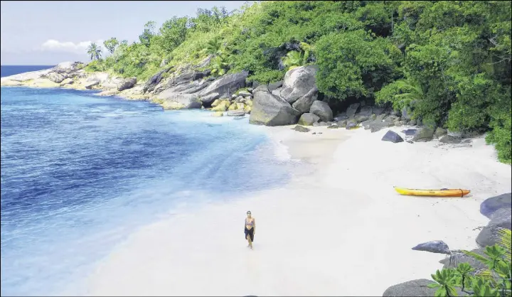  ?? STEVE MACNAULL PHOTOS ?? Anse Jasmin is one of hundreds of the beaches in the Seychelles accessible only by boat.