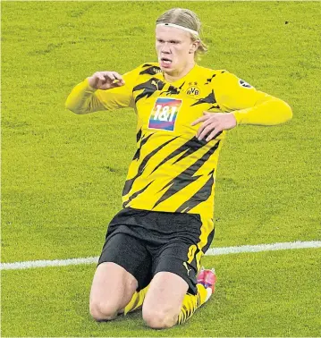  ?? REUTERS ?? Dortmund’s Erling Braut Haaland celebrates scoring against Bayern Munich in the Bundesliga on Saturday.