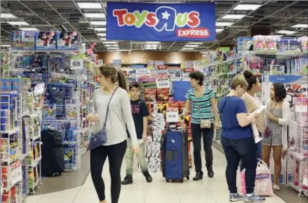  ?? THE ASSOCIATED PRESS FILE PHOTO ?? Toys "R" Us has filed for Chapter 11 bankruptcy protection in the U.S. It said it also plans to seek bankruptcy protection in Canada.