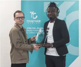  ?? ?? Benjamin Delsinger (Managerial Director of Together Gaming Solutions) presenting the TGS Fair Play Award January - March 2023 to Daniel Sowatey (San Gwann F.C.)