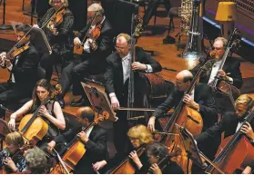  ?? Gabrielle Lurie / The Chronicle 2019 ?? The S.F. Symphony performs in 2019. For safety, no wind instrument­s will be used when the orchestra first resumes performanc­es at Davies Symphony Hall.