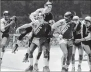  ??  ?? Charlie O’Connell leapfrogs a New York Chiefs teammates. The Chiefs beat the Cincinnati Jolters 50-44 for the world championsh­ip at Madison Square Garden in 1972.