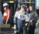  ?? RAINIER EHRHARDT/ THE ASSOCIATED PRESS ?? Brad Keselowski shows his disappoint­ment after his engine blew during the Alabama 500 on Sunday, costing him a spot in the third round of the Chase for the Sprint Cup Championsh­ip.