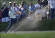  ?? BRAD HORRIGAN — HARTFORD COURANT VIA AP ?? Jordan Spieth hits his second shot on the ninth hole during the third round of the Travelers Championsh­ip golf tournament at TPC River Highlands on Saturday, June 24, 2017 in Cromwell, Conn.