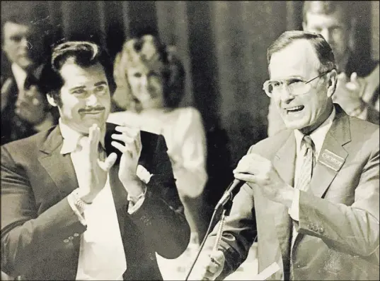 ??  ?? Wayne Newton and George H.W. Bush are pictured together in Las Vegas in a file photo from 1982.