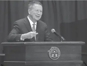  ?? SCHROEDER/COLUMBUS DISPATCH MADDIE ?? Former Gov. John Kasich smiles as he tells a joke to attendees during the unveiling ceremony for his official state portrait in 2019.