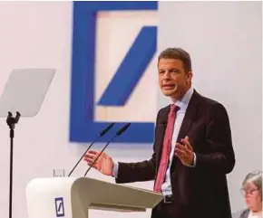  ?? PIC EPA ?? Deutsche Bank chief executive officer Christian Sewing speaking at the bank’s annual general meeting in Frankfurt yesterday.