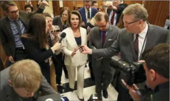  ?? PABLO MARTINEZ MONSIVAIS — THE ASSOCIATED PRESS ?? House Minority Leader Nancy Pelosi of Calif., speaks to reporters after staging a marathon, daylong filibuster, on Capitol Hill in Washington. Wednesday. Pelosi was attempting to force a House vote on protection­s for the “Dreamer” immigrants and to...