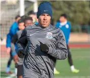  ?? AFP ?? Carlos Tevez takes part in his first training session with his new club Shanghai Shenhua in Shanghai on Saturday.—