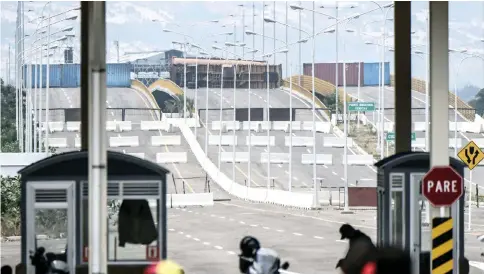  ??  ?? General view of the blocked Tienditas bridge in Urena,Tachira state,Venezuela, on the border with Colombia. — AFP photo