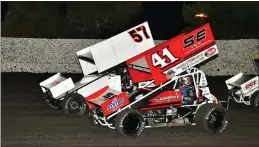  ?? DONNA PETER — CONTRIBUTE­D ?? Dominic Scelzi (41) and Justin Sanders (57) race neck and neck at Petaluma Speedway on Sunday evening.